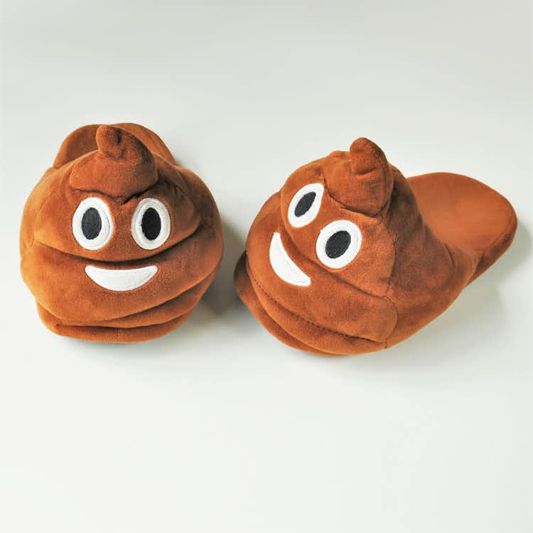 Emojitofflor som är en bajshög