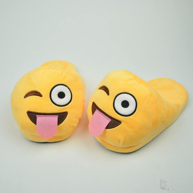 Emojitofflor som blinkar med tungan ute