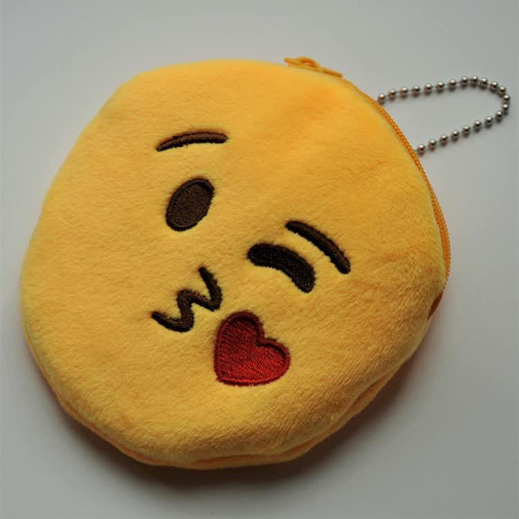 Emojiplånbok som skickar kyss